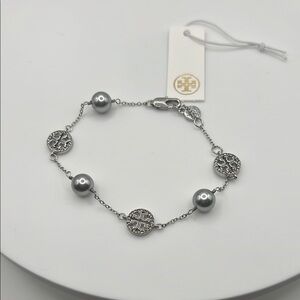 55. Tory Burch Silver Logo Bracelet